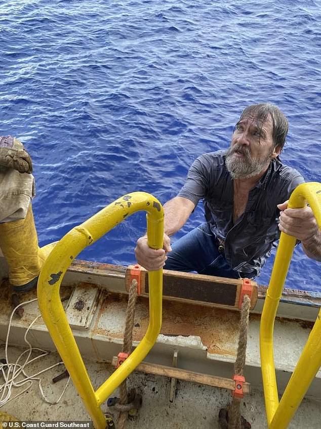 Stuart Bee, 62, climbs aboard the Angeles container ship after being found 86 miles from shore
