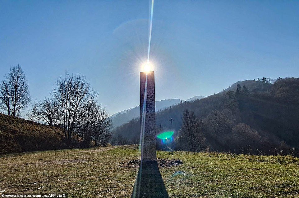 A mysterious metal monolith (pictured) that appeared in a Romanian town just days after a similar structure disappeared in Utah has also vanished