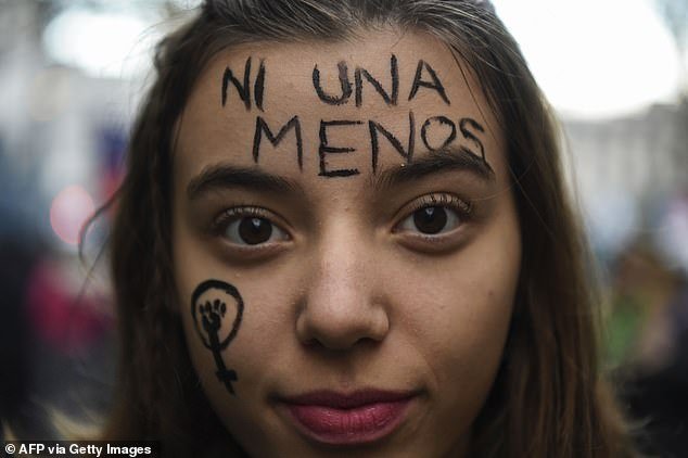 Abortion has been part of huge protests in Argentina under the slogan #NiUnaMenos (Not One Woman/Girl Less), which began as a demonstration against femicide but has expanded to include issues such as abortion and the sexual abuse of women. Pictured: A protester in Buenos Aires in 2018 [File photo]