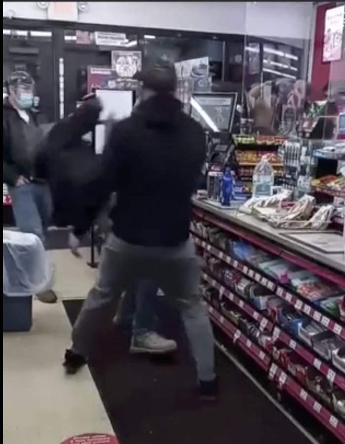 Black man smashes Twisted Tea can into white shopper