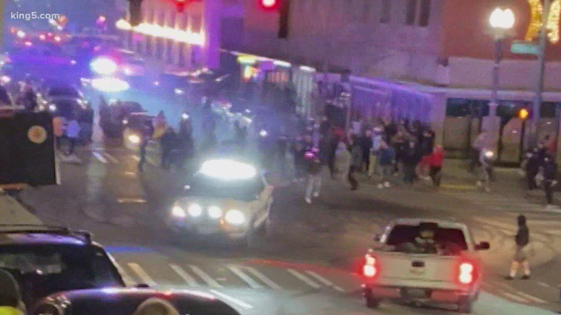 Tacoma officer who drove police car through crowd at street race has been identified | king5.com