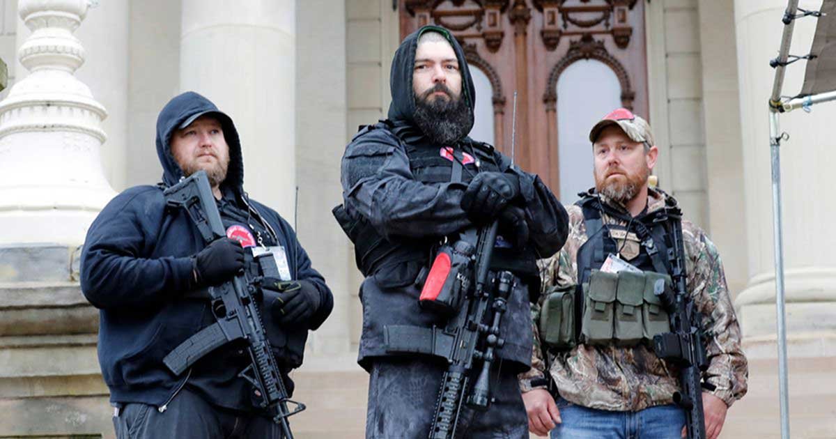 gettyimages 1211395465 0 1.jpg?resize=412,275 - Armed Protesters Arrive At Michigan Capitol