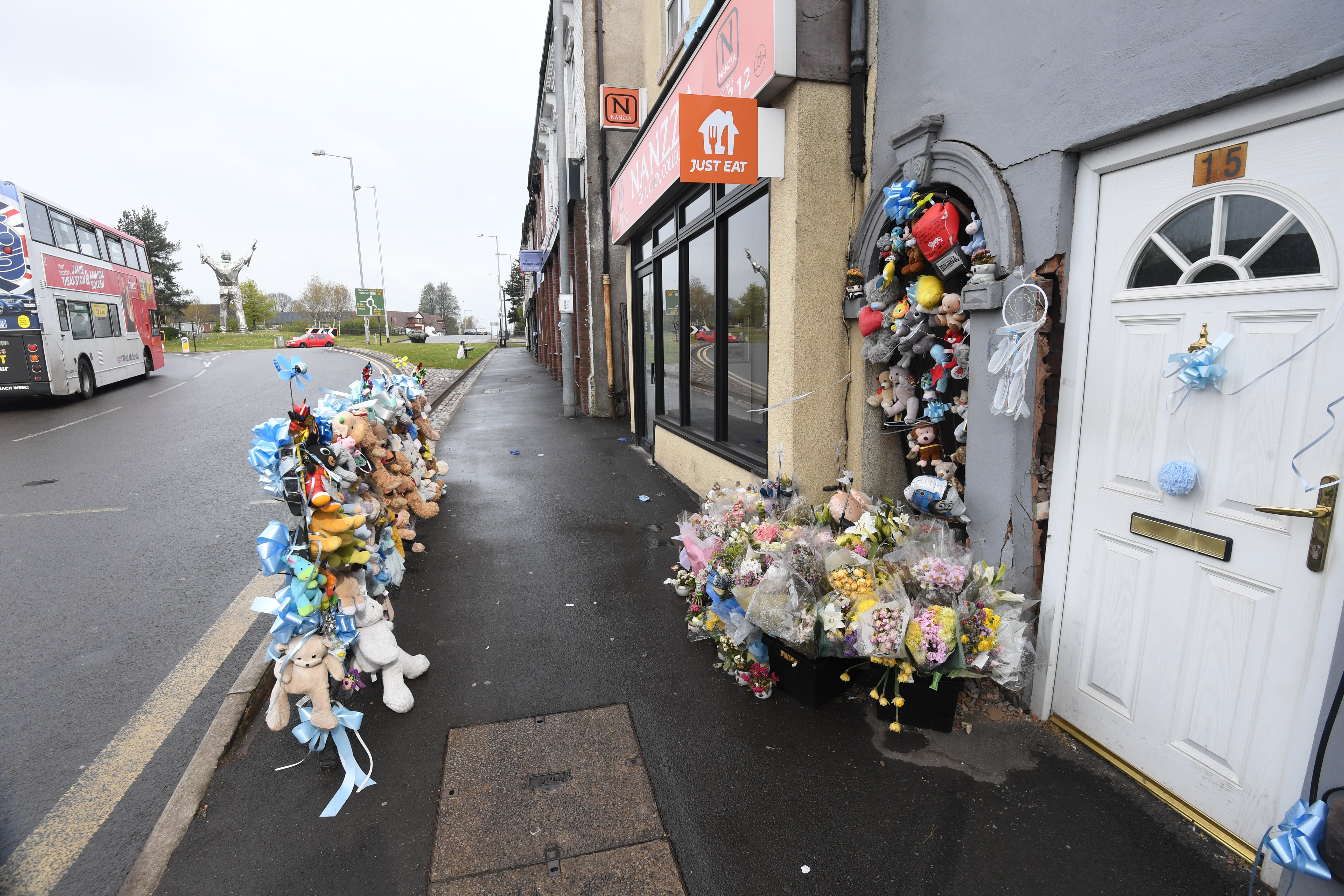 Flowers and soft toys were left at the scene