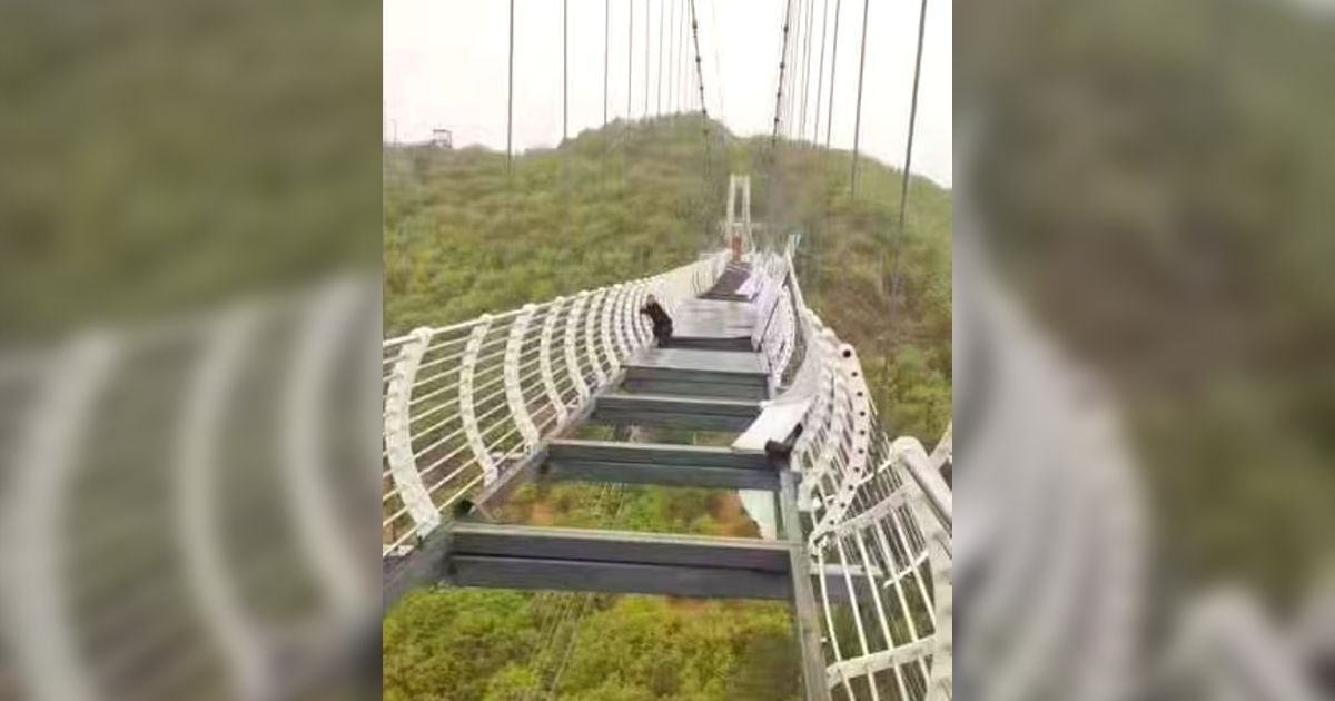 bridge5.jpg?resize=1200,630 - Man Is Left Dangling 330ft In The Air After Glass Panels Of Bridge Are Shattered By Strong Winds