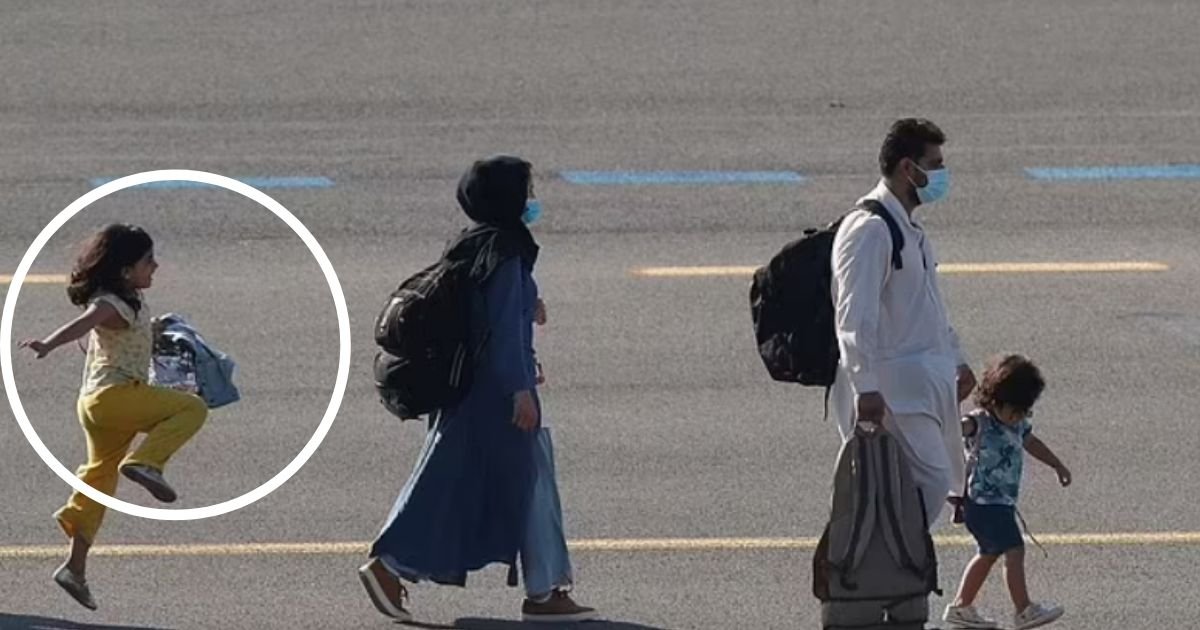 pa images 7.jpg?resize=1200,630 - Young Afghan Girl Celebrates Freedom From Taliban By Joyfully Skipping Across The Tarmac After Evacuation Flight Landed Safely In Belgium