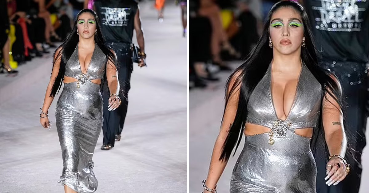 3 70.jpg?resize=1200,630 - Madonna's Daughter Heats Up The Runway At Versace Fashion Show In Strikingly 'Busty' Silver Cut Dress