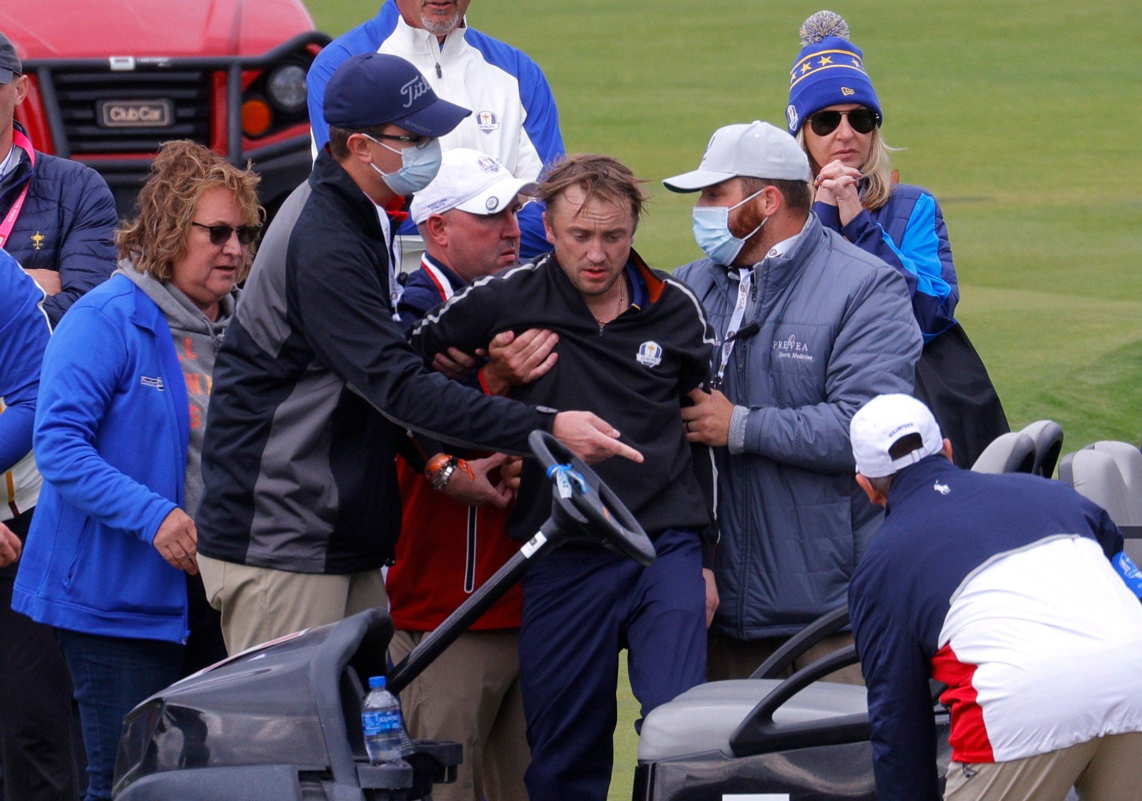 He had been carried to a golf cart after the health scare