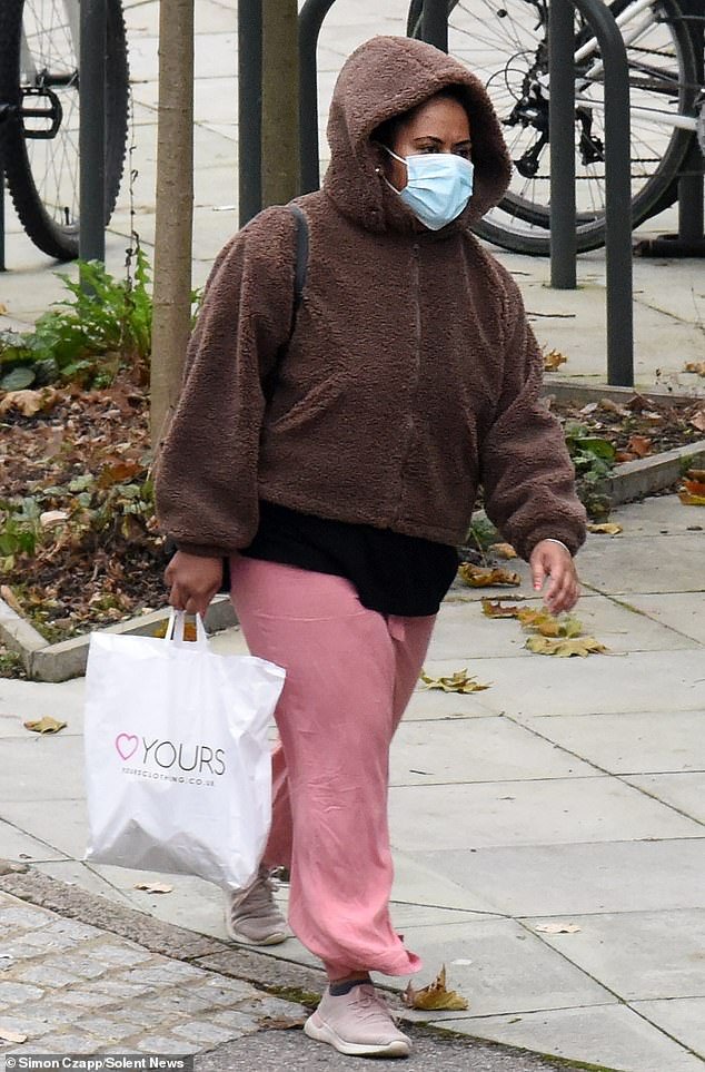 Silipa Keresi, 38, is accused of the murder of Maliki Keresi, who was found dead wrapped in a towel in woodland near to her home in Hythe, Hampshire. Pictured, Keresi arriving at Winchester Crown Court on Tuesday morning