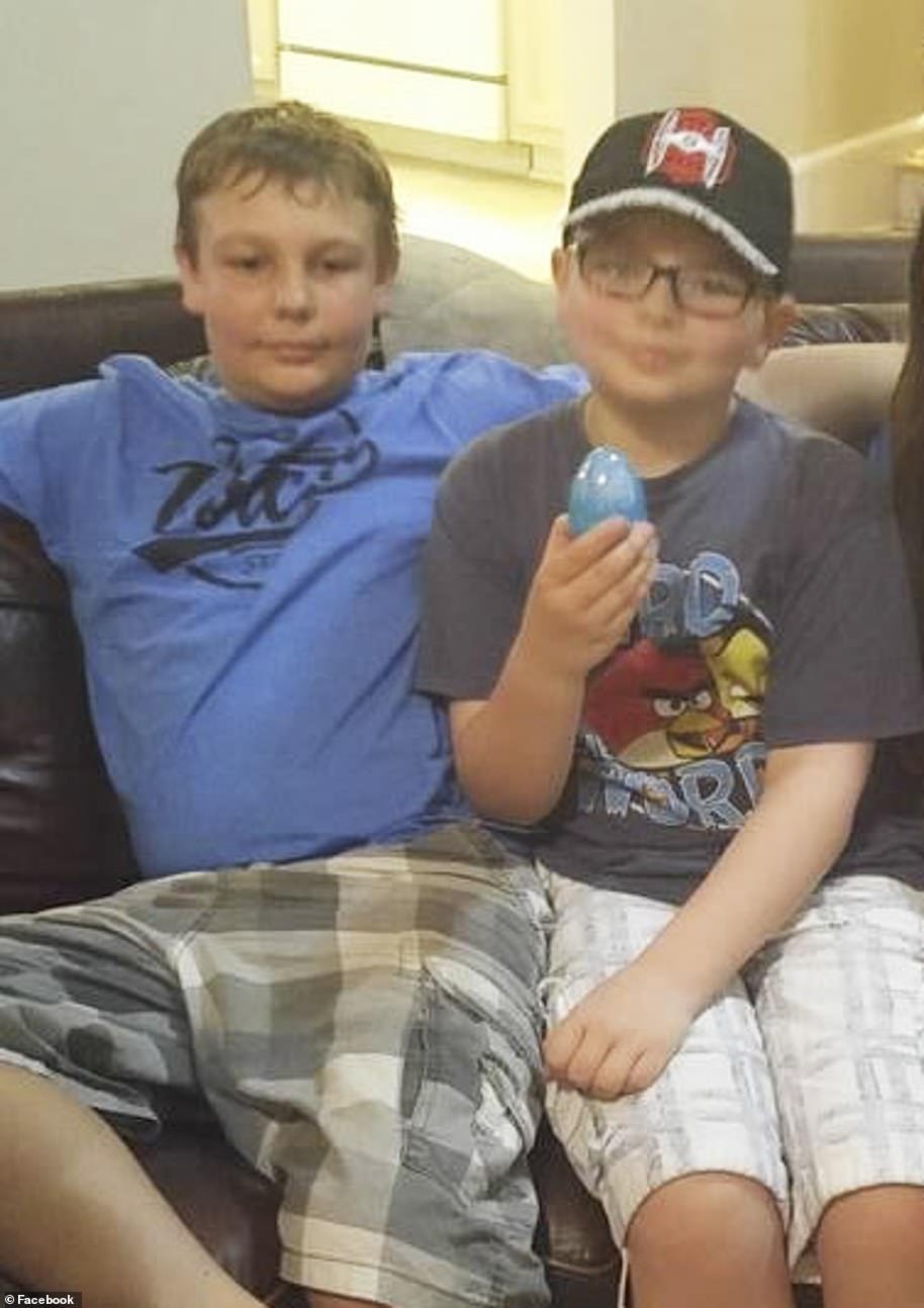 Eli, 18, (left) and Ethan, 15, (right) have the same father, but different mothers. The two boys grew up in Florida but later moved to Michigan with their dad James Crumbley and his second wife, Ethan