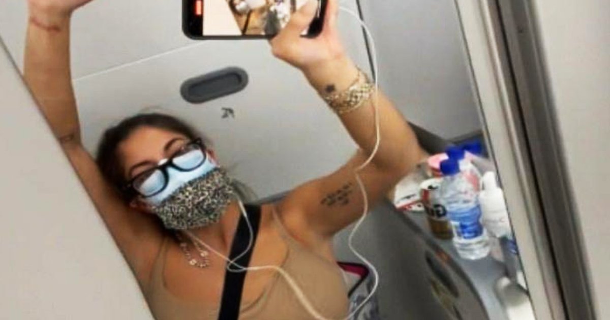 q8 12.jpg?resize=412,232 - Mid-Flight Drama As Teacher Forced To Isolate Herself In Plane's BATHROOM For '5 Hours' After Testing Positive For COVID