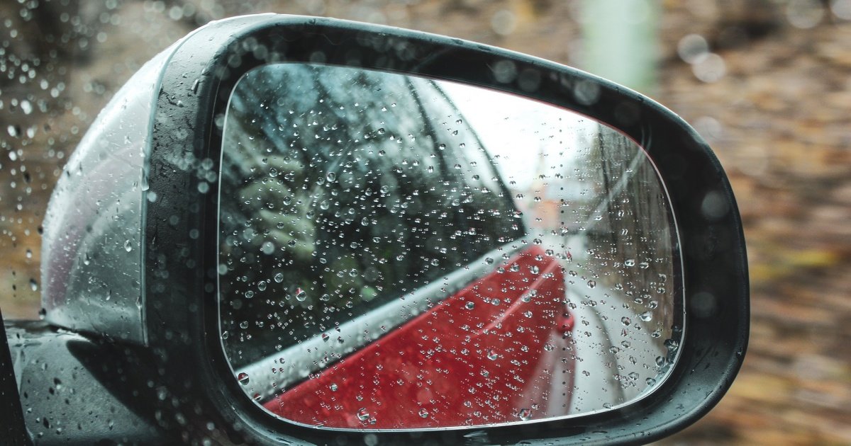 rainy day car side mirror