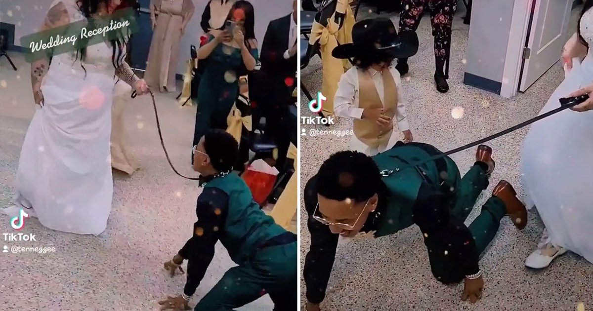 q8 5 2.jpg?resize=412,275 - Interracial Couple Sparks OUTRAGE With Bizarre 'Dog Leash' Wedding Entrance Dance