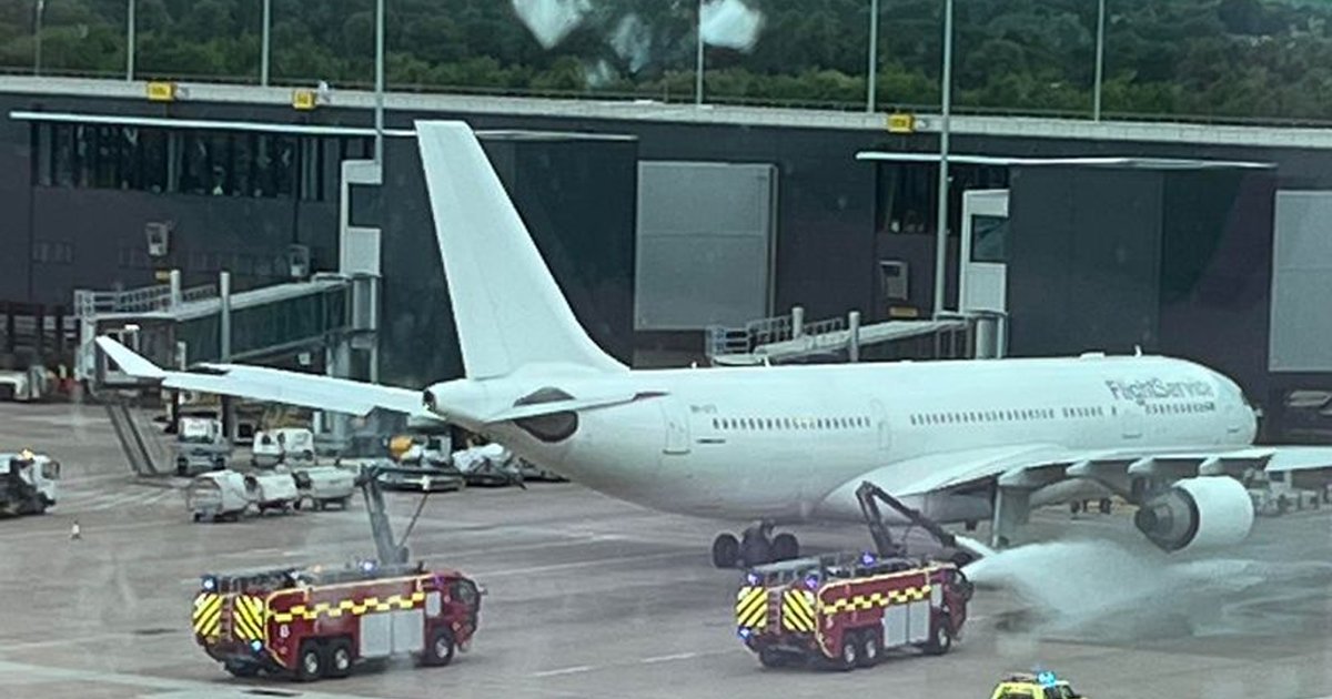 d63.jpg?resize=412,275 - BREAKING: Chaotic Scenes As Plane Catches Fire At Manchester Airport With Smoke Billowing From Engine