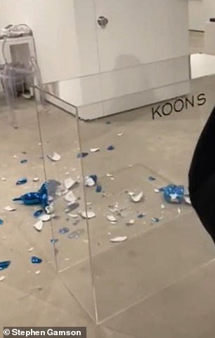 A ,000 limited edition blue porcelain balloon dog sculpture by world-famous artist Jeff Koons has been smashed by an art collector in downtown Miami