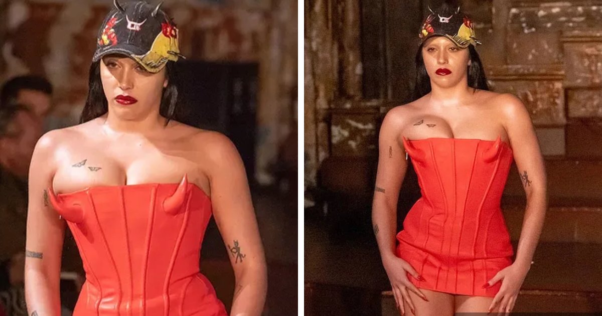 t1 13.png?resize=412,275 - EXCLUSIVE: Madonna's Daughter Looks FIERY Hot While Displaying Massive Cleavage In Red Mini Dress With HORNS At NY Fashion Week