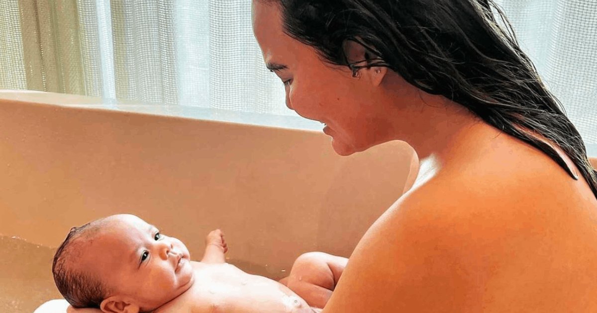 t4 19.png?resize=412,275 - Chrissy Teigen SLAMMED For 'Naked Clips' Featuring Her Cleavage Showing During Bath With Baby Daughter