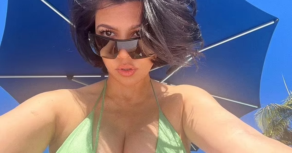t3 11.png?resize=412,275 - Pregnant Kourtney Kardashian Puts Her Growing Baby Bump On Display In A Skimpy Green Bikini