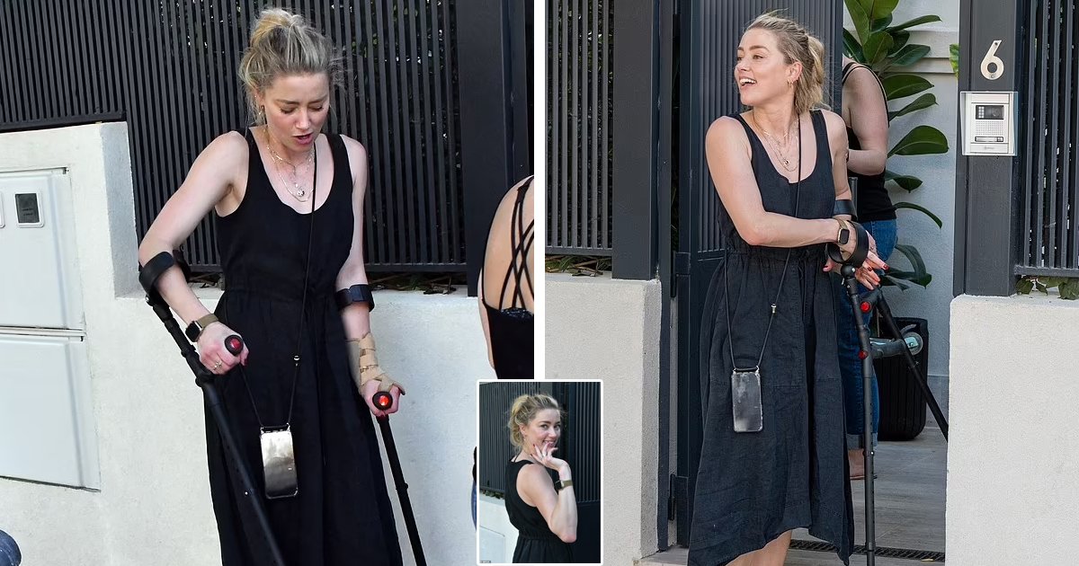 d70.jpg?resize=1200,630 - BREAKING: Amber Heard Pictured Hobbling On NYC's Streets Using Crutches