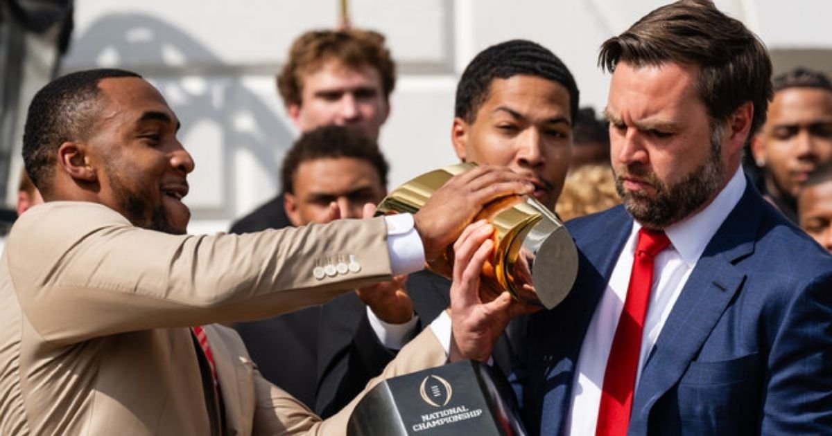 copy of articles thumbnail 1200 x 630 23 13.jpg?resize=1200,630 - People Lose it at Footage of JD Vance Accidentally Splitting National Championship Football Trophy in Half & Dropping It On The Ground in Front of Trump