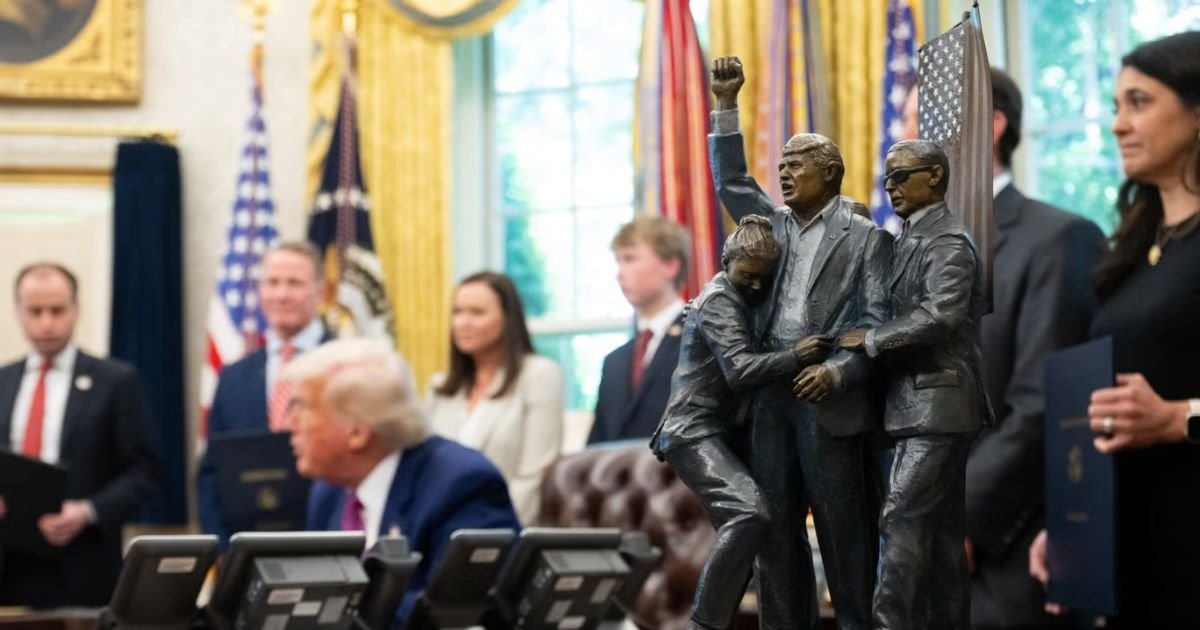copy of articles thumbnail 1200 x 630 38 2.jpg?resize=366,290 - Trump Unveils Massive 9-Foot Sculpture Depicting Aftermath of His Assassination Attempt in New Oval Office Statue