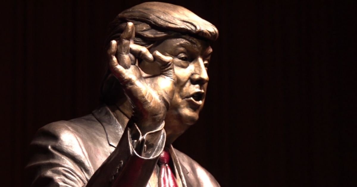 copy of articles thumbnail 1200 x 630 58.jpg?resize=412,275 - Protesters Gather Outside South Dakota Auditorium After Controversial Donald Trump Statue Unveiled